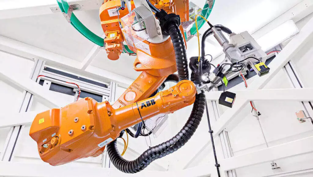Articolo-Pressofusi-ABB-03-1024x580-1 System laserowy LASIT i zrobotyzowane wnętrze ABB